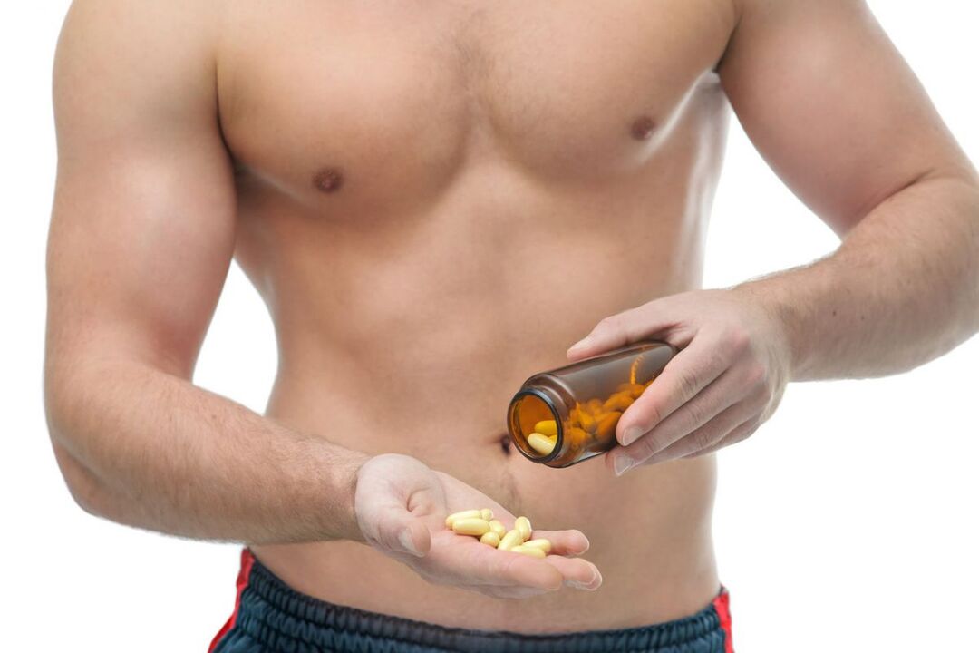 A man taking pills to improve potency